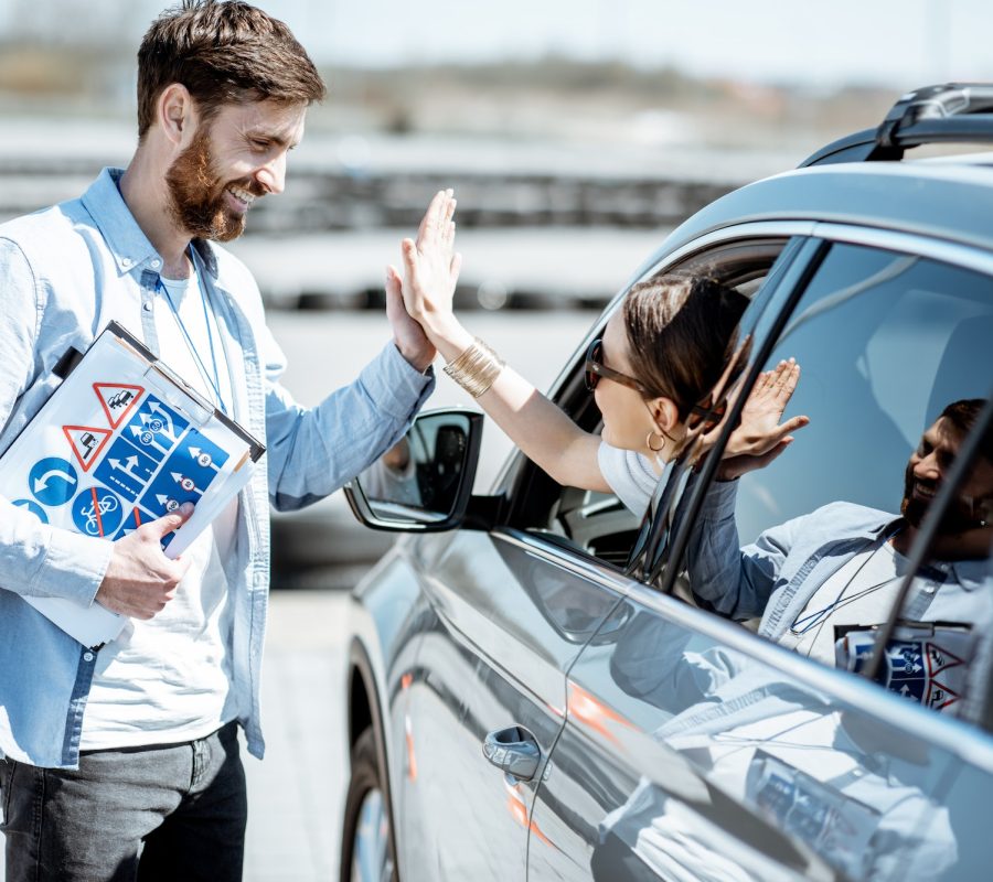 Instructor with driver on the training ground